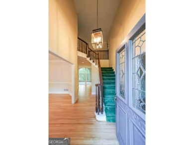 Stately custom European hard coat stucco traditional on on Canongate At Eagle Watch Golf Club in Georgia - for sale on GolfHomes.com, golf home, golf lot
