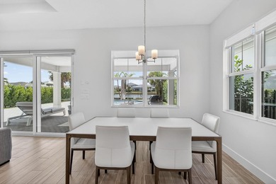 Waterfront living meets effortless luxury in this fully upgraded on Palm Beach Gardens Golf Course in Florida - for sale on GolfHomes.com, golf home, golf lot