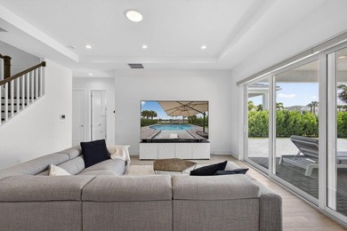 Waterfront living meets effortless luxury in this fully upgraded on Palm Beach Gardens Golf Course in Florida - for sale on GolfHomes.com, golf home, golf lot