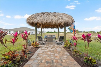 Escape the cold to the perfect SUNNY retreat in Northwest Cape on Burnt Store Golf Club in Florida - for sale on GolfHomes.com, golf home, golf lot