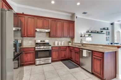 Enjoy CAPTIVATING views from this Luxury POOL Residence with on The Eagles Golf Course and Club in Florida - for sale on GolfHomes.com, golf home, golf lot