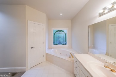 Stately custom European hard coat stucco traditional on on Canongate At Eagle Watch Golf Club in Georgia - for sale on GolfHomes.com, golf home, golf lot