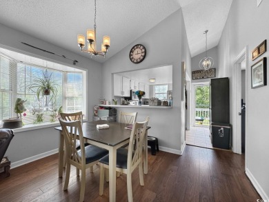 Welcome to this well-maintained 2-bedroom, 2-bath end unit on Heron Point Golf Club in South Carolina - for sale on GolfHomes.com, golf home, golf lot