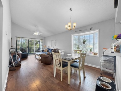 Welcome to this well-maintained 2-bedroom, 2-bath end unit on Heron Point Golf Club in South Carolina - for sale on GolfHomes.com, golf home, golf lot