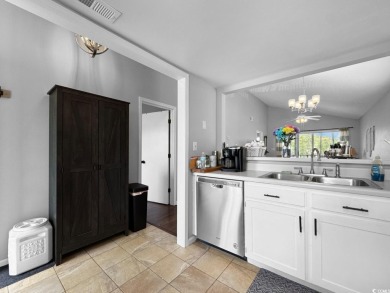 Welcome to this well-maintained 2-bedroom, 2-bath end unit on Heron Point Golf Club in South Carolina - for sale on GolfHomes.com, golf home, golf lot