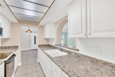 Charming 2-bed, 1-bath home on nearly half an acre (.45+/-) in on Sandridge Golf Course and Club in Florida - for sale on GolfHomes.com, golf home, golf lot