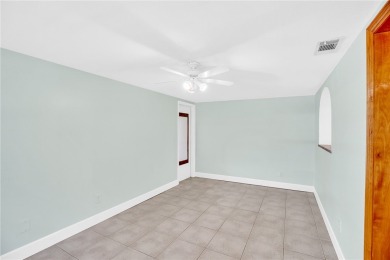Charming 2-bed, 1-bath home on nearly half an acre (.45+/-) in on Sandridge Golf Course and Club in Florida - for sale on GolfHomes.com, golf home, golf lot