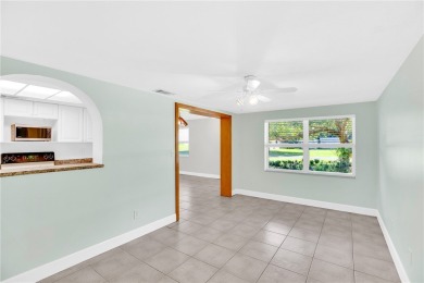 Charming 2-bed, 1-bath home on nearly half an acre (.45+/-) in on Sandridge Golf Course and Club in Florida - for sale on GolfHomes.com, golf home, golf lot