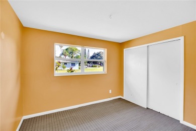 Charming 2-bed, 1-bath home on nearly half an acre (.45+/-) in on Sandridge Golf Course and Club in Florida - for sale on GolfHomes.com, golf home, golf lot