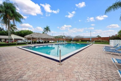 DISCOVER FLORIDA LIVING at its finest in this 2/2 villa in the on Medalist Golf Club in Florida - for sale on GolfHomes.com, golf home, golf lot