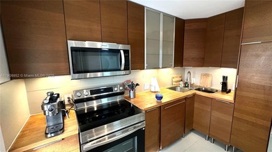 Beautifully updated unit featuring a breathtaking golf course on  in Florida - for sale on GolfHomes.com, golf home, golf lot