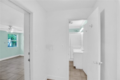 Charming 2-bed, 1-bath home on nearly half an acre (.45+/-) in on Sandridge Golf Course and Club in Florida - for sale on GolfHomes.com, golf home, golf lot