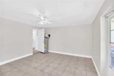 Charming 2-bed, 1-bath home on nearly half an acre (.45+/-) in on Sandridge Golf Course and Club in Florida - for sale on GolfHomes.com, golf home, golf lot