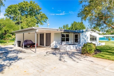 Charming 2-bed, 1-bath home on nearly half an acre (.45+/-) in on Sandridge Golf Course and Club in Florida - for sale on GolfHomes.com, golf home, golf lot