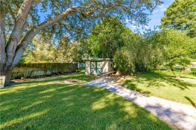 Charming 2-bed, 1-bath home on nearly half an acre (.45+/-) in on Sandridge Golf Course and Club in Florida - for sale on GolfHomes.com, golf home, golf lot