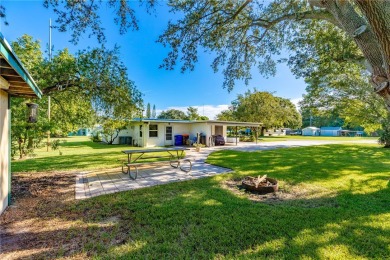 Charming 2-bed, 1-bath home on nearly half an acre (.45+/-) in on Sandridge Golf Course and Club in Florida - for sale on GolfHomes.com, golf home, golf lot