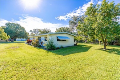 Charming 2-bed, 1-bath home on nearly half an acre (.45+/-) in on Sandridge Golf Course and Club in Florida - for sale on GolfHomes.com, golf home, golf lot