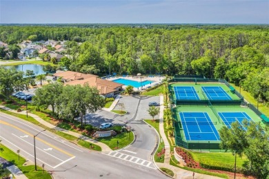 Nestled in the charming and luxurious, 24-hour guard gated on Stoneybrook East Golf Club in Florida - for sale on GolfHomes.com, golf home, golf lot