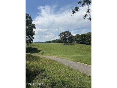 This beautiful gently sloping lot is located at the 2nd tee box on Tellico Village -The Links At Kahite Golf Course in Tennessee - for sale on GolfHomes.com, golf home, golf lot