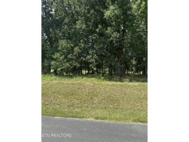 This beautiful gently sloping lot is located at the 2nd tee box on Tellico Village -The Links At Kahite Golf Course in Tennessee - for sale on GolfHomes.com, golf home, golf lot