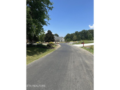 This beautiful gently sloping lot is located at the 2nd tee box on Tellico Village -The Links At Kahite Golf Course in Tennessee - for sale on GolfHomes.com, golf home, golf lot