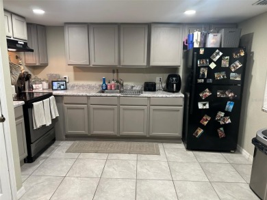 This beautifully updated 2-bedroom, 2-bath condo in Silver on Country Club At Silver Springs Shores in Florida - for sale on GolfHomes.com, golf home, golf lot