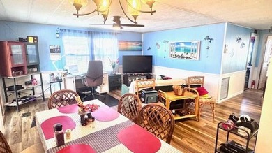 This cozy house is in the very desirable 55+ Old Bridge Village on Riverbend Golf and Country Club in Florida - for sale on GolfHomes.com, golf home, golf lot