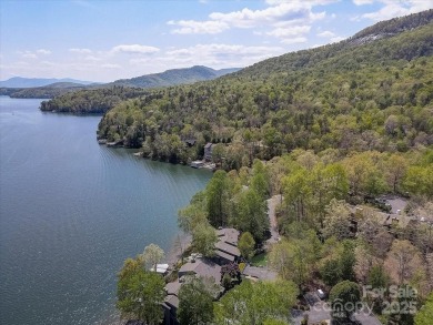 Newly renovated with brand new furnishings, fresh interior paint on Rumbling Bald Resort on Lake Lure in North Carolina - for sale on GolfHomes.com, golf home, golf lot