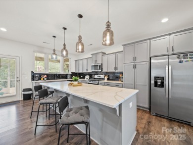 Nestled on a serene cul-de-sac lot with a picturesque pond view on Edgewater Golf Club in South Carolina - for sale on GolfHomes.com, golf home, golf lot