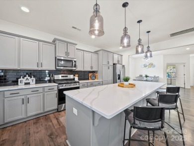 Nestled on a serene cul-de-sac lot with a picturesque pond view on Edgewater Golf Club in South Carolina - for sale on GolfHomes.com, golf home, golf lot