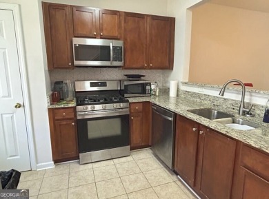 TEMPORARLY OFF THE MARKET UNTIL TENANT MOVES OUT AT THE END OF on Browns Mill Golf Course in Georgia - for sale on GolfHomes.com, golf home, golf lot