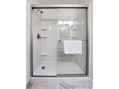 Welcome to your dream condo at Lake of the Ozarks! Its ready to on The Oaks Golf Course in Missouri - for sale on GolfHomes.com, golf home, golf lot
