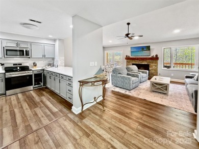 Newly renovated with brand new furnishings, fresh interior paint on Rumbling Bald Resort on Lake Lure in North Carolina - for sale on GolfHomes.com, golf home, golf lot