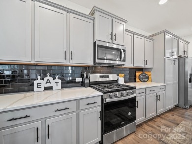 Nestled on a serene cul-de-sac lot with a picturesque pond view on Edgewater Golf Club in South Carolina - for sale on GolfHomes.com, golf home, golf lot