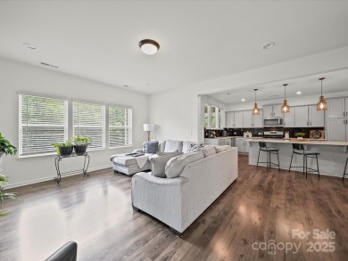 Nestled on a serene cul-de-sac lot with a picturesque pond view on Edgewater Golf Club in South Carolina - for sale on GolfHomes.com, golf home, golf lot