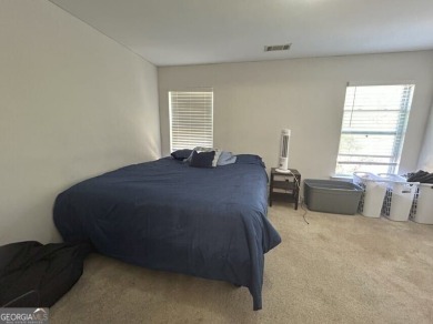 TEMPORARLY OFF THE MARKET UNTIL TENANT MOVES OUT AT THE END OF on Browns Mill Golf Course in Georgia - for sale on GolfHomes.com, golf home, golf lot