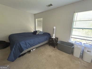 TEMPORARLY OFF THE MARKET UNTIL TENANT MOVES OUT AT THE END OF on Browns Mill Golf Course in Georgia - for sale on GolfHomes.com, golf home, golf lot