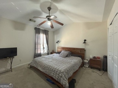 TEMPORARLY OFF THE MARKET UNTIL TENANT MOVES OUT AT THE END OF on Browns Mill Golf Course in Georgia - for sale on GolfHomes.com, golf home, golf lot