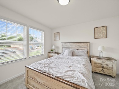 Nestled on a serene cul-de-sac lot with a picturesque pond view on Edgewater Golf Club in South Carolina - for sale on GolfHomes.com, golf home, golf lot
