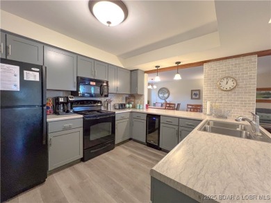 Welcome to your dream condo at Lake of the Ozarks! Its ready to on The Oaks Golf Course in Missouri - for sale on GolfHomes.com, golf home, golf lot
