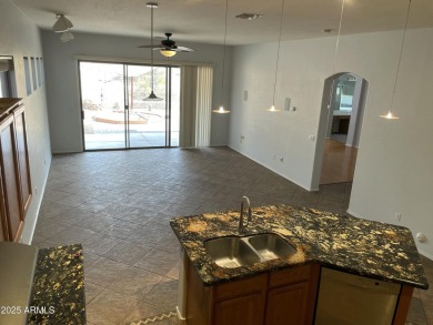 This spacious 4-bedroom, 2-bathroom home offers plenty of living on Gold Canyon Golf Resort - Sidewinder in Arizona - for sale on GolfHomes.com, golf home, golf lot
