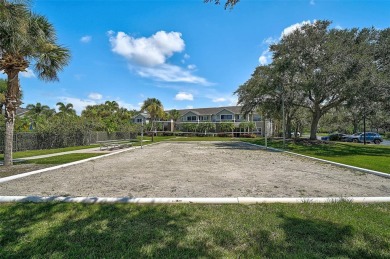 Welcome to The Village at Town Park Built in 2001!  This Light on Lakewood Ranch Golf and Country Club in Florida - for sale on GolfHomes.com, golf home, golf lot