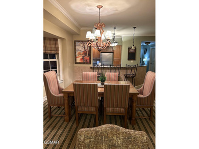 Experience luxury mountain living at its finest in this elegant on Gatlinburg Golf Course in Tennessee - for sale on GolfHomes.com, golf home, golf lot