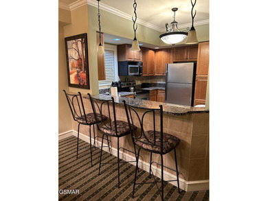 Experience luxury mountain living at its finest in this elegant on Gatlinburg Golf Course in Tennessee - for sale on GolfHomes.com, golf home, golf lot