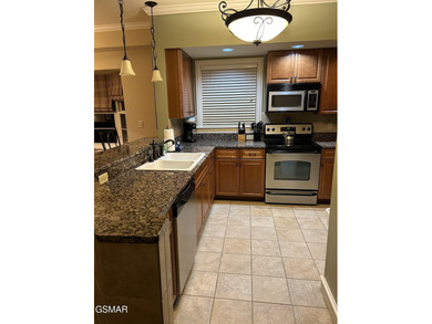 Experience luxury mountain living at its finest in this elegant on Gatlinburg Golf Course in Tennessee - for sale on GolfHomes.com, golf home, golf lot