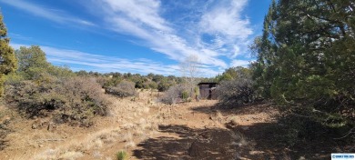 Charming Southwestern Retreat with Stunning Views: This on Silver City Golf Course in New Mexico - for sale on GolfHomes.com, golf home, golf lot