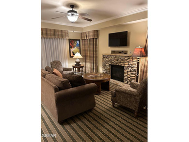 Experience luxury mountain living at its finest in this elegant on Gatlinburg Golf Course in Tennessee - for sale on GolfHomes.com, golf home, golf lot