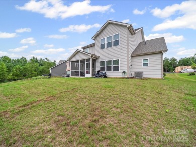 Nestled on a serene cul-de-sac lot with a picturesque pond view on Edgewater Golf Club in South Carolina - for sale on GolfHomes.com, golf home, golf lot