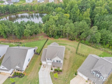 Nestled on a serene cul-de-sac lot with a picturesque pond view on Edgewater Golf Club in South Carolina - for sale on GolfHomes.com, golf home, golf lot