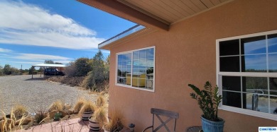 Charming Southwestern Retreat with Stunning Views: This on Silver City Golf Course in New Mexico - for sale on GolfHomes.com, golf home, golf lot